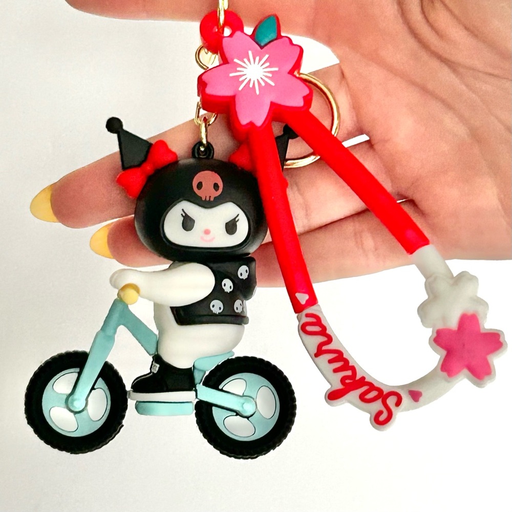 💜Kuromi Riding on Bicycle Adorable Keychain Backpack Accessory